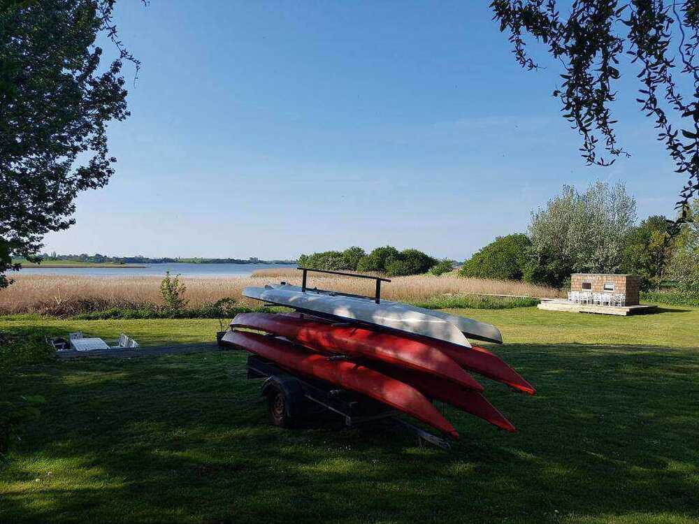 Canoes by the lake at Stege Nor
